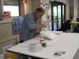 Spreading Gesso with a Discarded Foam Board