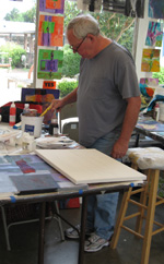 John Working on his Canvas Series